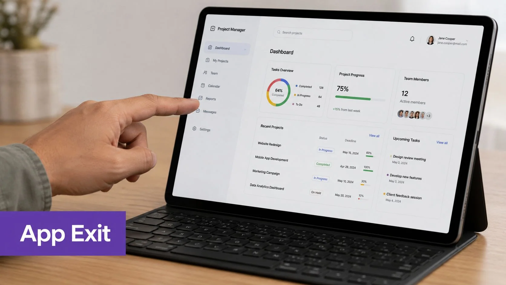 A hand pointing at the reports menu on a tablet screen showing a project management dashboard interface.