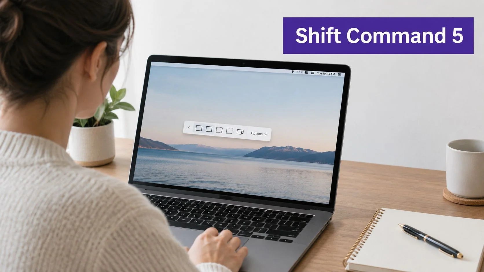 A woman working on a laptop displaying the macOS screenshot and screen recording toolbar overlay.